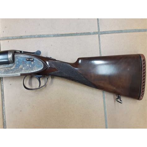 Photographie d'un fusil juxtaposé Hijos de F. Arizaga Eibar avec détails des marquages