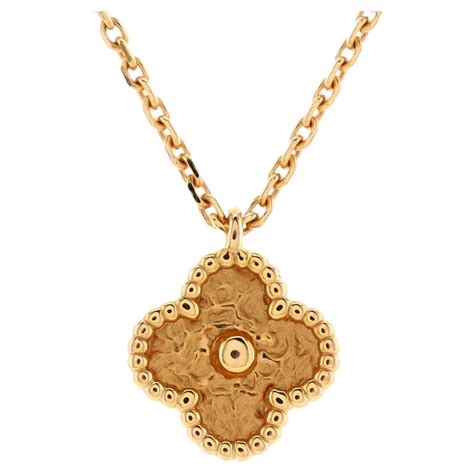 Schéma des dimensions et des matériaux du pendentif Alhambra en or rose 18 carats.