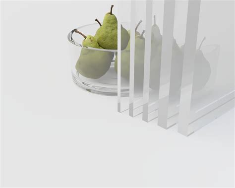 Détail des boutons allongés en méthacrylate d'une commode de bijouterie.