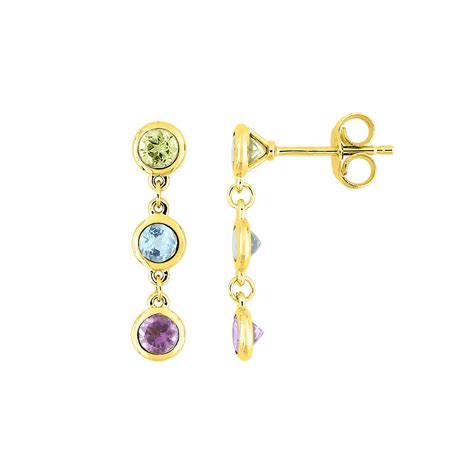 collection de pendentifs et boucles d'oreilles en péridot