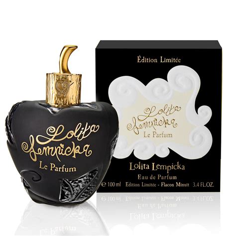 Flacon de parfum masculin Lolita Lempicka en forme d'arbre avec un cœur gravé.