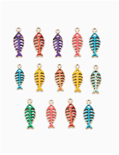 Collection de pendentifs en forme d'arête de poisson en argent plaqué or, rhodium et ruthénium