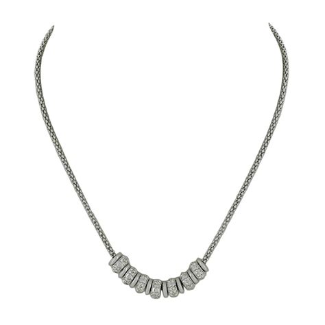 Collier en métal rhodié avec pendentif Swarovski scintillant