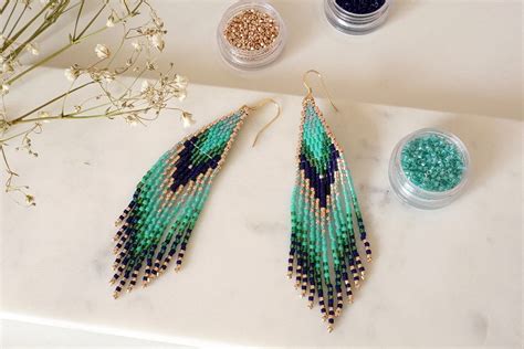 Photographie de boucles d'oreilles fantaisie avec perles Miyuki vert émeraude