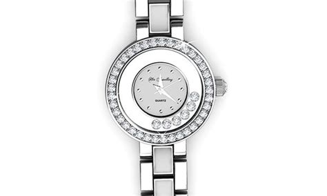 Montre de luxe ornée de cristaux Swarovski, avec un design élégant et scintillant.