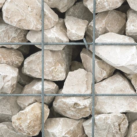 Mosaïque de différentes pierres naturelles (calcaire, ardoise, granit, quartz) utilisées pour les sols