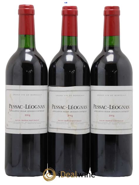 Photographie du coffret de vin Pessac-Léognan Rouge avec les bouteilles millésimées.