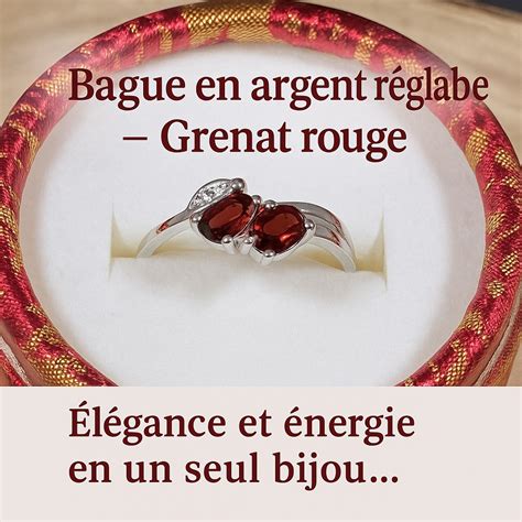 Une bague ornée d'un grenat rouge profond, symbolisant la passion et la vitalité.