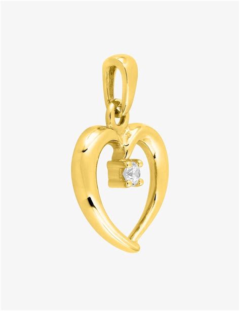 Pendentif cœur Amélia plaqué or avec un oxyde de zirconium central lumineux.