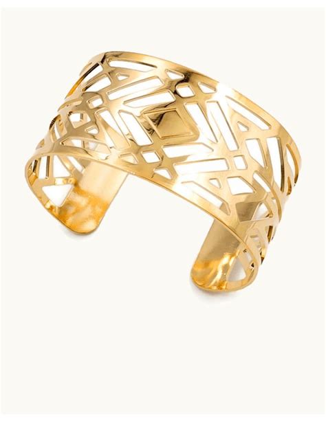 Exemple de bracelet manchette ajouré en argent avec pierres