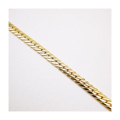 Illustration d'un bracelet en argent massif 18 carats à maille anglaise, mettant en valeur sa finesse et son éclat.