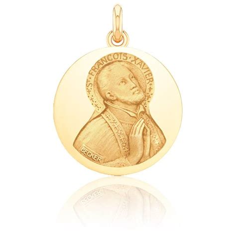 Exemple de bague ancienne en or avec médaille de saints