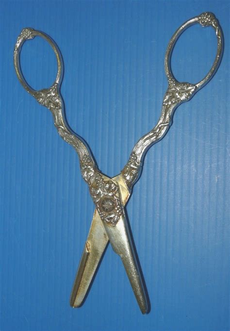 Paire de ciseaux à raisin en argent massif poinçon sanglier