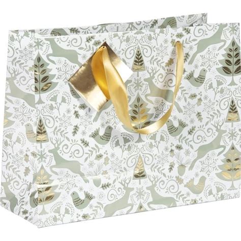 Exemple d'emballage cadeau premium Swarovski avec un sac et un nœud.