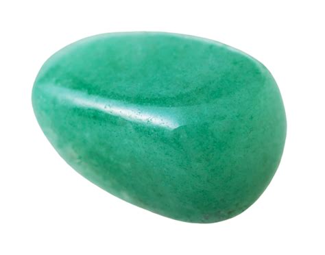 Vue rapprochée d'une pierre d'aventurine jaune montrant ses inclusions scintillantes et sa couleur chaude.