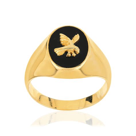 Chevalière aigle en or jaune avec plateau en onyx noir