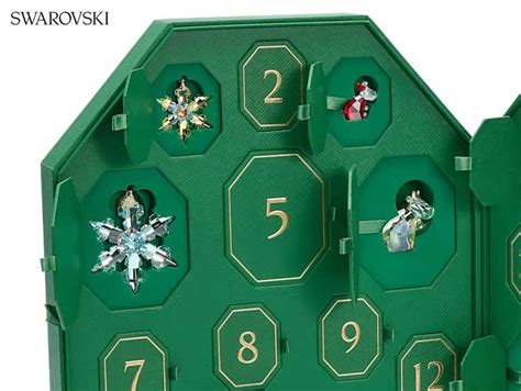 Image d'un calendrier de l'Avent Swarovski luxueux en forme d'écrin octogonal rouge orné de cristaux