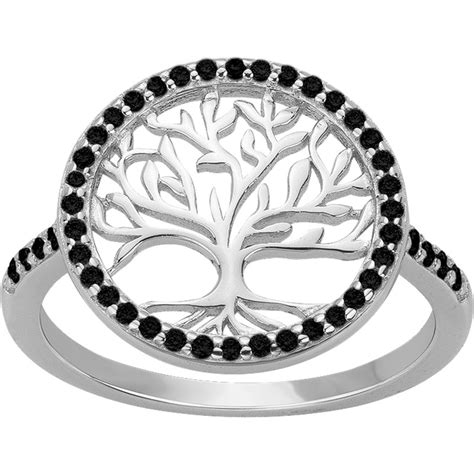 Une bague en argent ornée de petits oxydes de zirconium noirs disposés en motif.