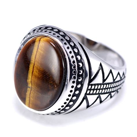 Bague chevalière en argent 925 avec une pierre œil de tigre aux reflets dorés et bruns