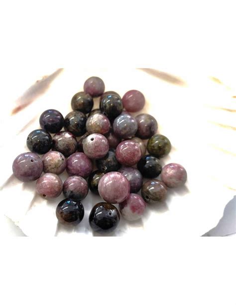 Collage de tourmalines de différentes couleurs : rose, verte, bleue, bicolore