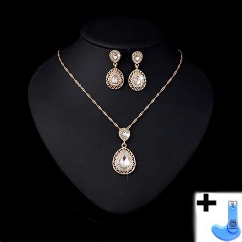 collier et boucles d'oreilles en forme d'astres et de lune