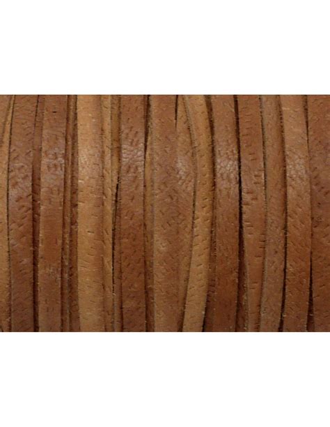 Ensemble des matériaux nécessaires : lanière de cuir, passants, colle, fermoirs, cabochon