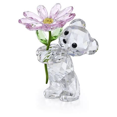 Photographie d'une décoration d'intérieur Swarovski, comme une figurine ou un objet décoratif lumineux.