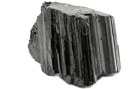 Illustration stylisée de la pierre de tourmaline noire avec des ondes d'énergie protectrices émanant d'elle.