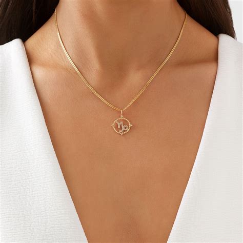 Pendentif signe du zodiaque Capricorne en or blanc