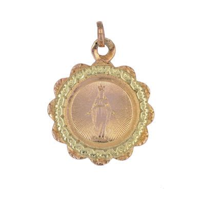 Illustration d'une médaille de baptême ancienne avec des motifs religieux