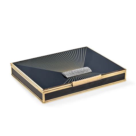 Minaudière Van Cleef & Arpels avec décor en laque noire et or jaune