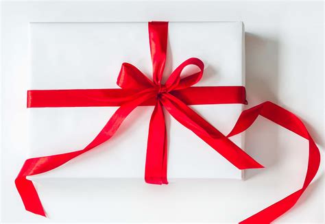 Emballage cadeau premium Swarovski avec ruban.