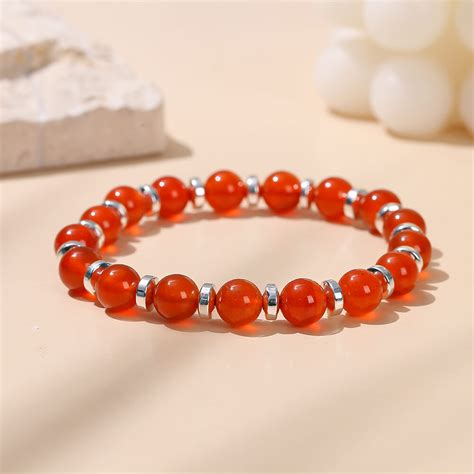 Schéma des trois pierres principales du bracelet : cornaline, quartz rose, pierre de lune.