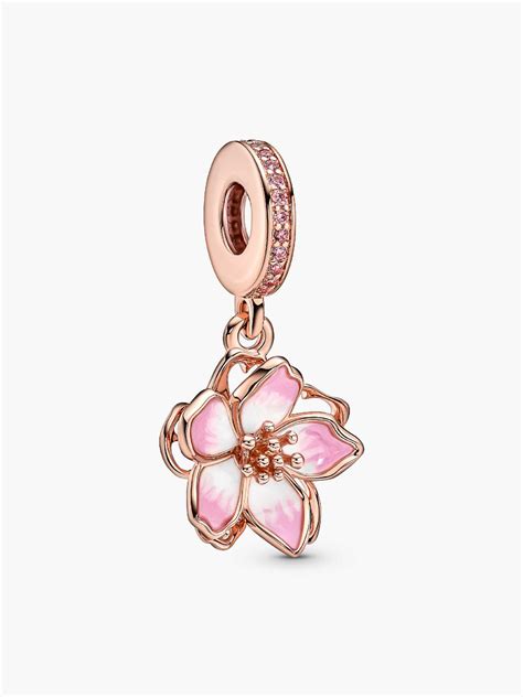 Charm Pandora en forme de boîte cadeau, orné de zirconias cubiques bleus.