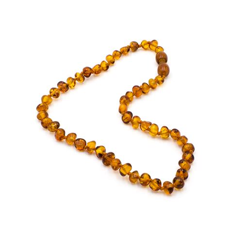 Collier d'ambre pour bébé avec des perles polies et sécurisées par des nœuds