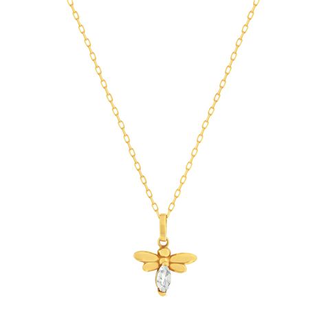 Collier en or jaune 375 avec un pendentif libellule orné de zirconias